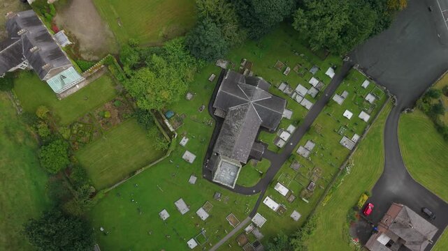Overhead aerial of St Michael's Church of Ireland and its graveyard seen from directly above, Castlecaulfield, County Tyrone, Northern Ireland