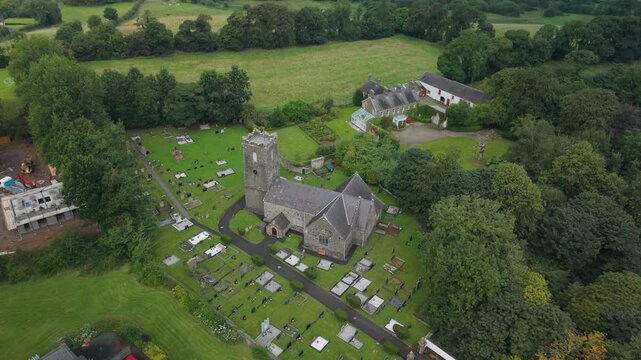 Aerial view of St Michael's Church of Ireland, its churchyard and the farmland behind, Castlecaulfield, County Tyrone, Northern Ireland