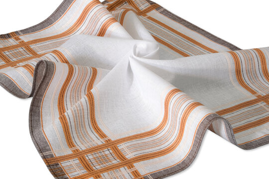Vintage white handkerchief with a classic orange and brown plaid pattern isolated on a white background.