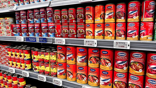 Rows of shelves with a wide selection of sardines and canned goods. Bekasi, Indonesia, August 27, 2026
