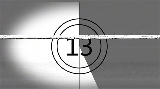 Classic monochrome film leader countdown featuring numbers 18 through 0 inside concentric circles with a rotating clock-hand wipe effect and vintage film grain/glitch artifacts.