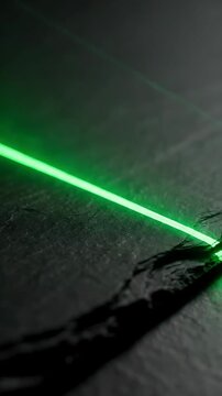Green Laser Beam Moving Across Dark Textured Surface, Creating Dynamic Light Trails and Abstract Patterns. with Motion Graphics