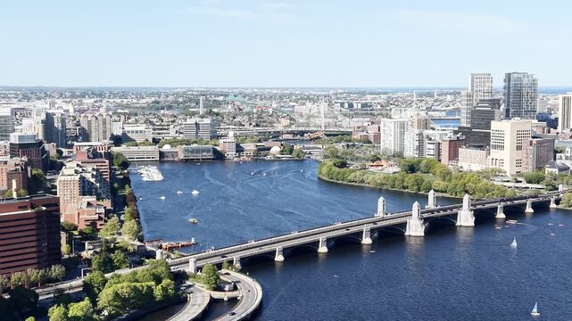 Aerial view of Boston skyline and sailboats competition on the Charles River in Massachusetts, USA on a clear summer day. g.