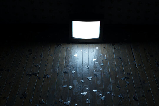 3d Rendering of an hardwood floor covered by glass shards and footprints illuminated by television with an isolated PNG screen