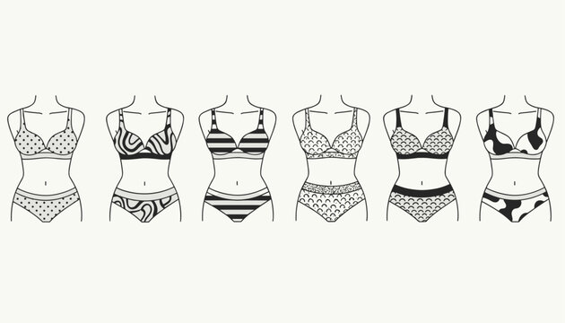 Set of six stylish women lingerie sets with different trendy patterns on headless mannequin torsos over white background.