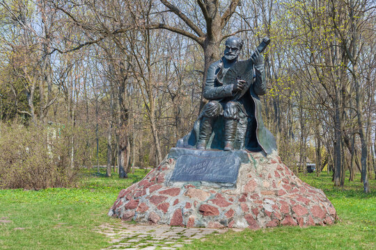 Horizontal view of the historic monument to Ukrainian kobzar Ostap Veresay in Sokyryntsi park