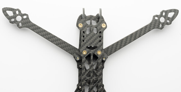 Drone frame made of carbon fiber on a white background