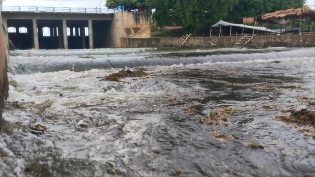Low Angle View of Water Flowing from Sluice Gate Dam