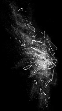 Shattered Glass Shards Exploding in Motion on Black Background