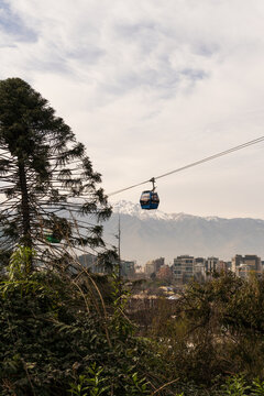Cable car at Santiago Metropolitan Park. Andes Mountains in the background. Sunny day