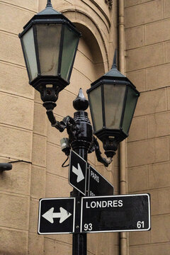 The famous corner of Paris Street and London Street in Santiago, Chile. Street signs alongside the streetlamp