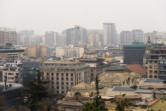 View of downtown Santiago from Santa Lucia Hill, Chile. Sky with haze and clouds. Overcast