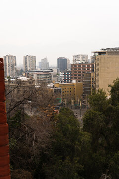 View of downtown Santiago from Santa Lucia Hill, Chile. Sky with haze and clouds. Overcast