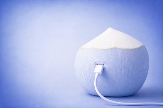 Coconut charging concept with cable and blue minimal 3D render