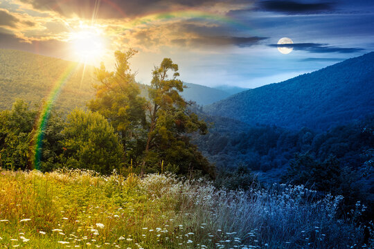 rural mountain landscape of ukraine at twilight. countryside scenery of transcarpathia in summer. night meet day concept. forested hills and grassy meadows under epic sky