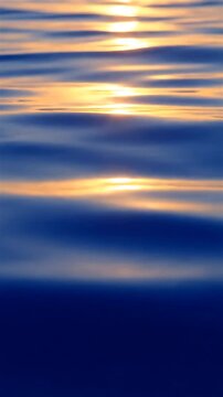 Water Surface Rippling with Golden Sunlight Reflecting, Creating a Dynamic, Flowing Abstract Background. and Ripples