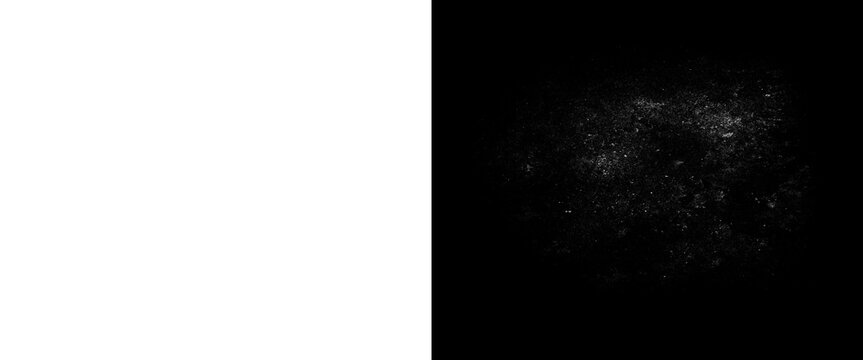 Abstract white dust particles on black background, grainy texture overlay, cinematic monochrome spray effect for design