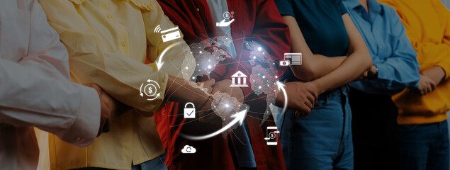 Group of diverse individuals standing together with digital icons illustrating concepts like...
