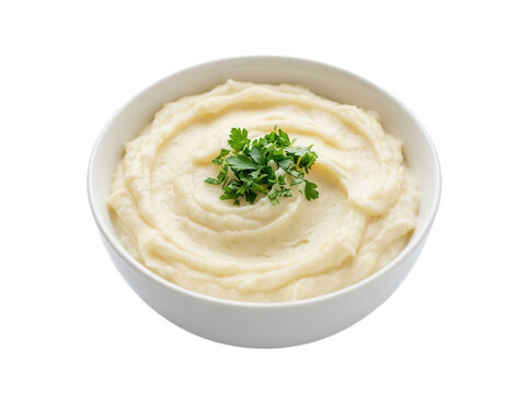 Creamy mashed potatoes in white bowl isolated on transparent background