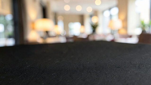 Terrazzo Tabletop With Embedded Marble Flecks on Chic Rooftop Lounge with Ambient Warm Uplighting Lu