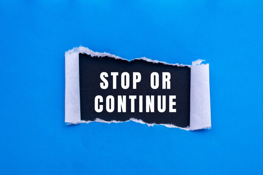 Stop or Continue text concept photo