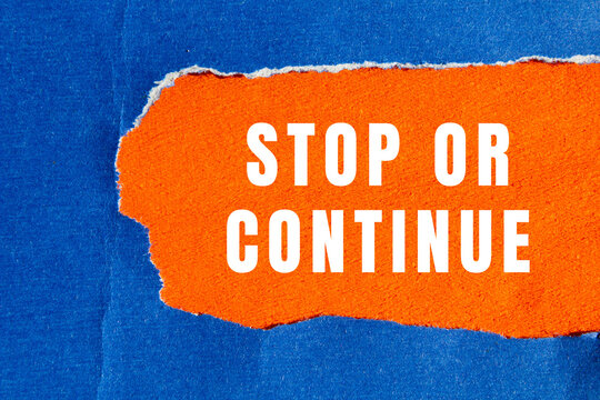 Stop or Continue text concept photo