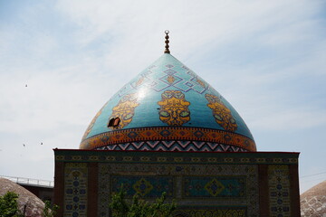 Blue-tiled dome of the Blue Mosque in Yerevan, Armenia, an example of Islamic architecture in the city. © Szymon