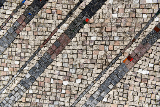 Abstract mosaic stone tile wall texture pattern background with diagonal geometric lines