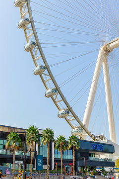 Dubai, UAE - February 8, 2026: Structural elements of Ain Dubai observation wheel rise against clear sky above Bluewaters Island. Landmark showcases contemporary engineering and construction design
