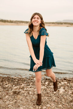 Girl Standing by Lake
