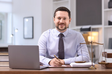 Obraz premium Portrait of professional lawyer at desk in office