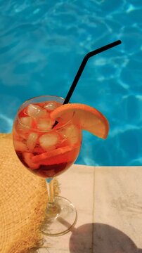 cocktails with aperol spritz and pool. selective focus.