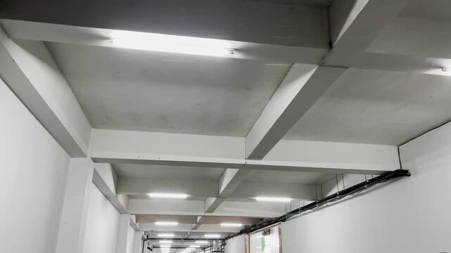 Perspective view of modern concrete beams structure indoor