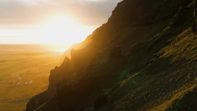 Dramatic Backlit Cliffs at Sunset, Aerial Iceland