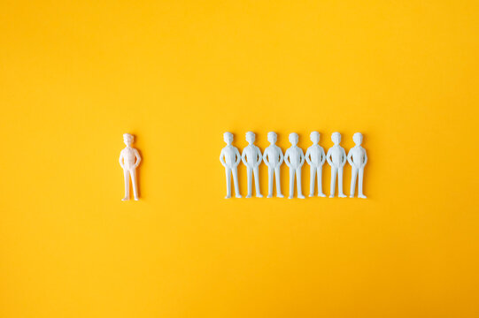Workplace exclusion and social isolation with one person separated from group