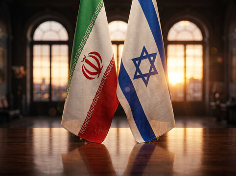 tabletop flags of iran and israel stand on a wooden table in a meeting room during warm sunset lighting symbolizing international relations diplomacy and political dialogue