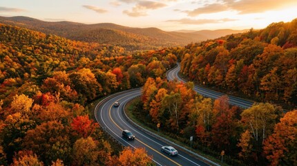 Naklejka premium Scenic Autumn Drive Through Vibrant Fall Foliage in Mountains.