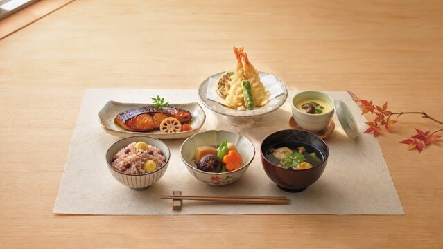 敬老の日の祝い膳 栗赤飯と天ぷらや焼き魚を盛った秋のごちそう