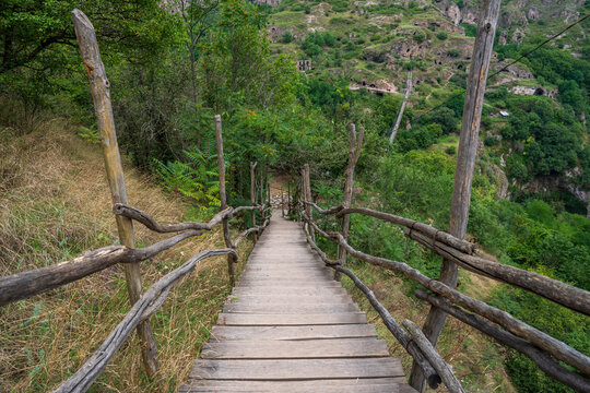 An old wooden bridge leading down