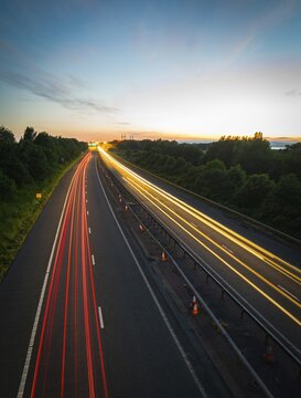 Road from above with many white and red light trails. Germany