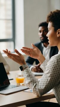 Confident Young African Woman Presenting Ideas in a Modern Corporate Office Meeting