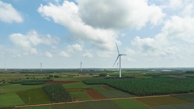 Wind farm under the blue sky and white clouds of the Baltic Sea in Xuwen County, Zhanjiang, Guangdong