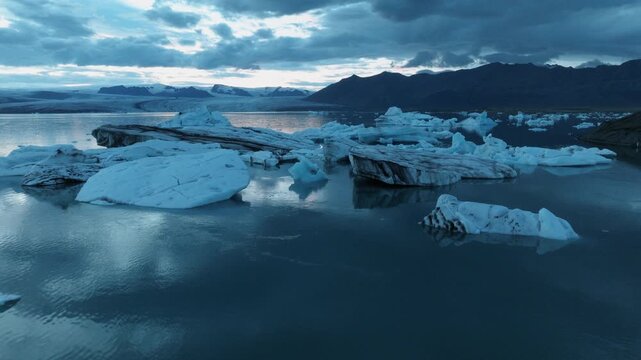 Close Aerial of Icebergs Floating in Glacial Lagoon, Iceland