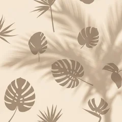 Minimalist tropical leaf shadow pattern featuring silhouettes of monstera deliciosa and palm fronds cast on a light neutral beige surface for aesthetic background design. © Tan Jia Hui