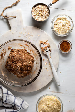 A bowl of mixed ingredients for making energy balls, ready for forming.