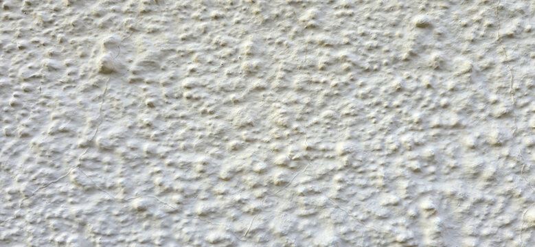 White rough stucco wall texture background surface