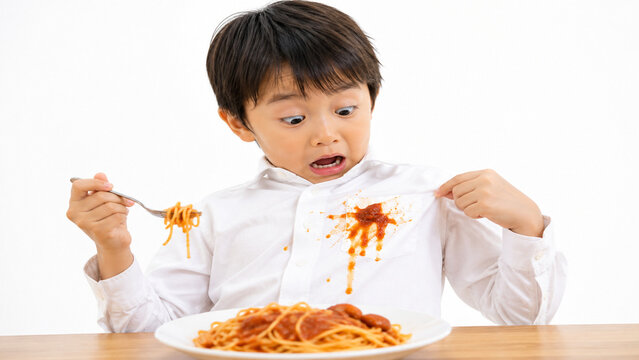 Young Japanese Boy Shocked by Tomato Sauce Stain on White Shirt While Eating Spaghetti