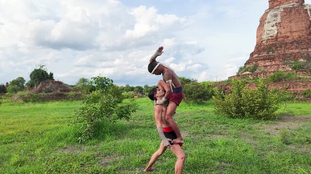Muay Thai Fighters Practicing Traditional Martial Arts at Ayutthaya Historical Site