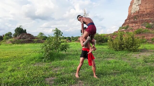 Muay Thai Fighters Performing Acrobatic Martial Arts at Ayutthaya Ruins