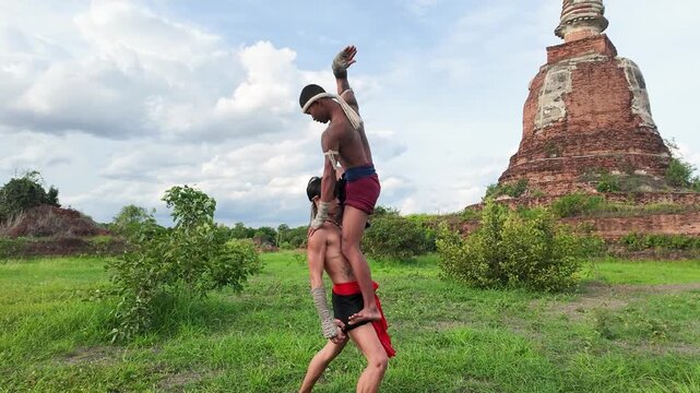 Muay Thai Fighters Performing Acrobatic Martial Arts at Ayutthaya Ruins